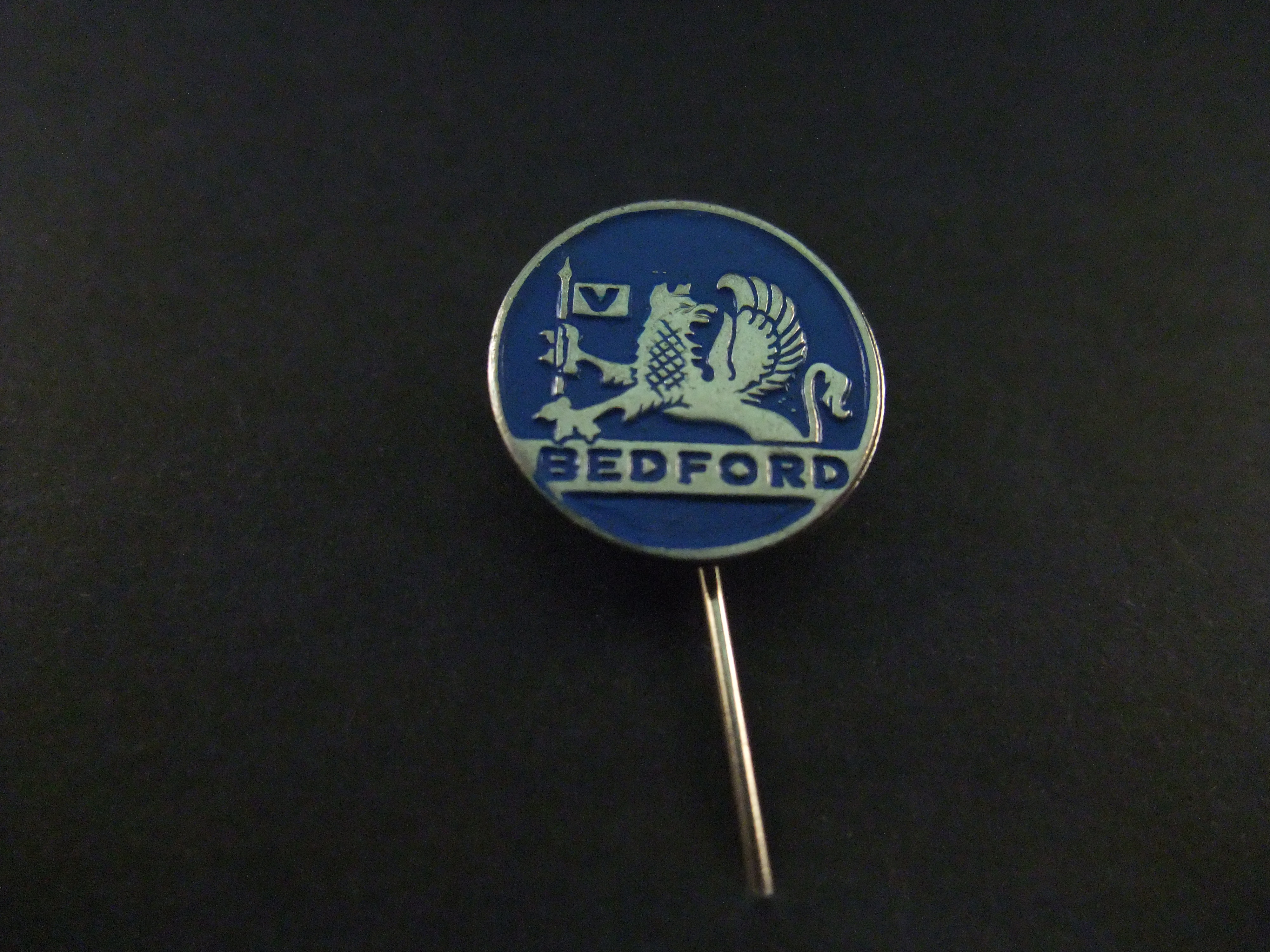 Bedford vrachtwagen blauw ( zilverkleurig) logo